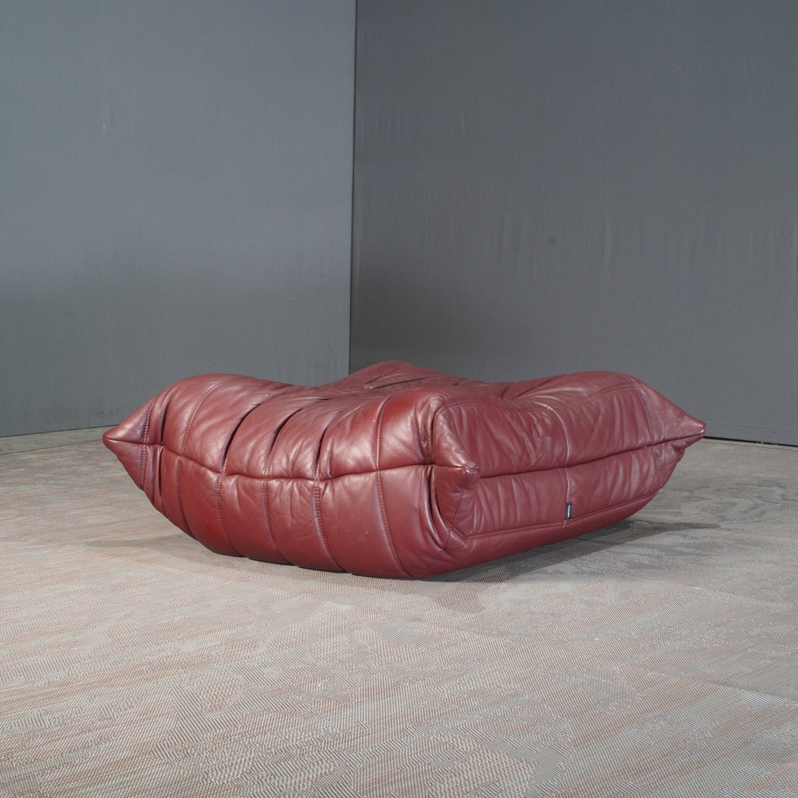 Ligne Roset Burgundy Leather Modular Sofas and Footstool, by Michel Ducaroy, Set of Six @ REHAUS