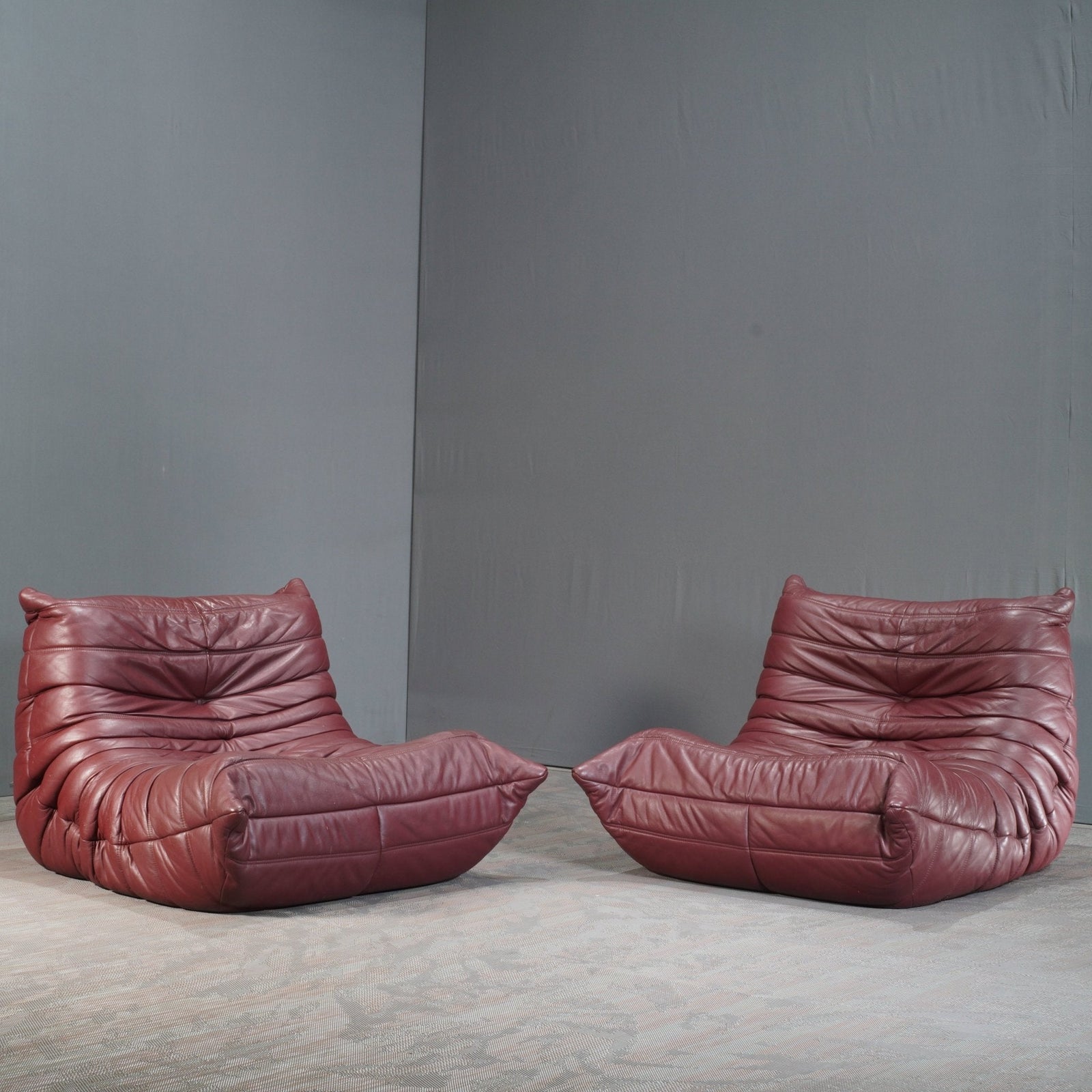Ligne Roset Burgundy Leather Modular Sofas and Footstool, by Michel Ducaroy, Set of Six @ REHAUS