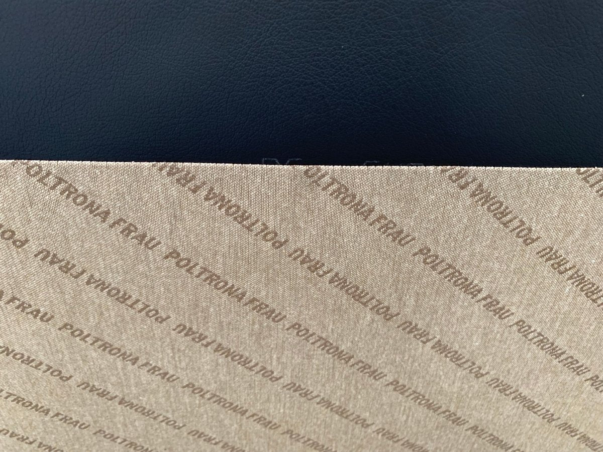 Poltrona Frau Kennedee Armchair in Black Pelle Frau SC Leather @ REHAUS