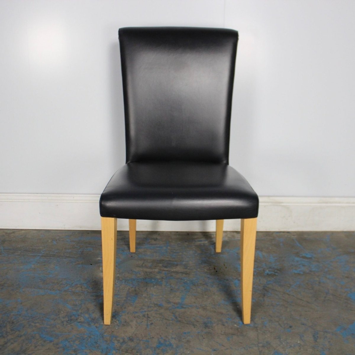 Poltrona Frau Vittoria Dining Chair in Black Pelle Frau Leather @ REHAUS