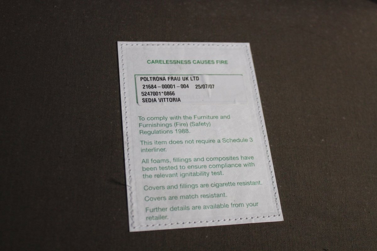 Poltrona Frau Vittoria Dining Chair in Black Pelle Frau Leather @ REHAUS